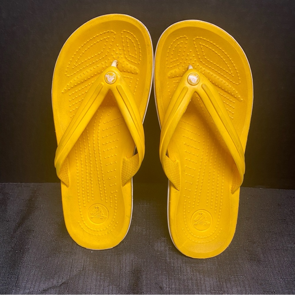 CROCS Yellow Flip Flops. Men’s size 7, women’s size 9